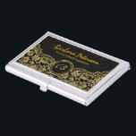 Caja Para Tarjetas De Visita Elegantes damascos florales de color negro y dorad<br><div class="desc">Elegantes torres ornamentales de color negro y dorado enmarcan y damascos florales vintage en tonos negros y dorados. Disponible en otros productos. Iniciales personalizados al frente. Esta es una plantilla y es completamente personalizable.</div>