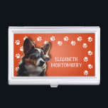 Caja Para Tarjetas De Visita Impresiones de la pintura de Dog Walker<br><div class="desc">Este titular de tarjeta de visita,  personalizado con su nombre,  presenta un lindo perrito terrer sobre un naranja brillante con un borde de impresión de pata blanca. Diversión como regalo o una gran manera de llevar tus propias tarjetas de visita.</div>