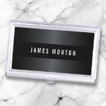 Caja Para Tarjetas De Visita Moderno masculino gris negro elegante personalizad<br><div class="desc">Perfil negro moderno,  sencillo pero elegante y masculino o portatarjetas de visita con gradiente negro y gris y banda horizontal más oscura. nombre de personalizable,  texto blanco. Diseño elegante,  ideal para un abogado,  abogado o contador.</div>