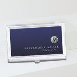 Caja Para Tarjetas De Visita Monograma mínimo de plata azul de la marina de luj<br><div class="desc">Diseño monograma minimalista con medallón monograma de plata metálica cepillado con nombre y título personalizado o texto personalizado debajo sobre un fondo degradado en tonos azul marino. Personalice el producto para su personalizado.</div>