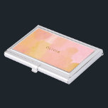 Caja Para Tarjetas De Visita Pintado abstracto de acuarela rosa y dorada<br><div class="desc">Una combinación de bonito de pinceladas rosa,  amarillo,  dorado y naranja de color acuático y formas orgánicas,  abstractas,  personalizadas con el nombre o las palabras de su elección.</div>