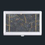 Caja Para Tarjetas De Visita Textura de mármol negro y dorado de lujo<br><div class="desc">Imagen de textura de mármol negro y dorado de lujo con acento de rayas doradas. Monograma de personalizable,  aspecto grabado en relieve.</div>
