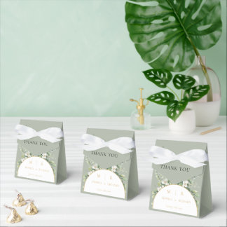 Cajas de regalo de boda con monograma botánico en