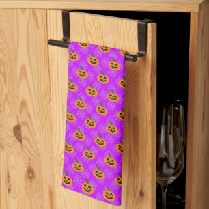 Calabaza de Halloween con toallas de cocina morada
