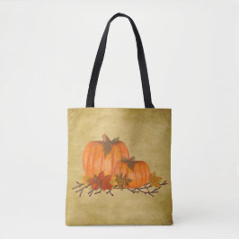 Calabazas de otoño por toda la bolsa de papel de i