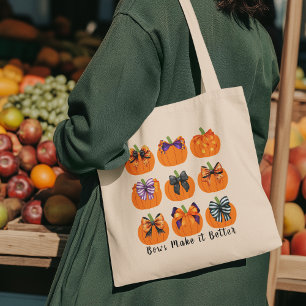 Calabazas naranjas con bolsa de tocador cuadrada d
