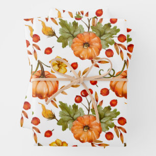 Calabazas otoñales, bayas rojas y hojas