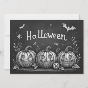 Calabazas y murciélagos de Halloween en pizarra