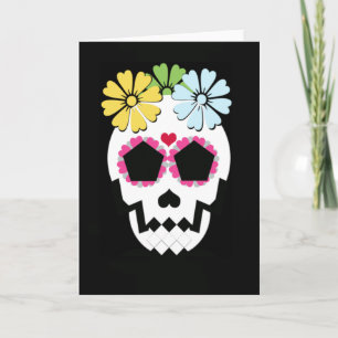 Calavera con tarjeta de saludo de flores