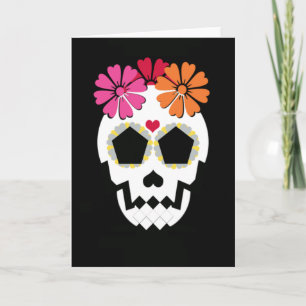 Calavera con tarjeta de saludo de flores