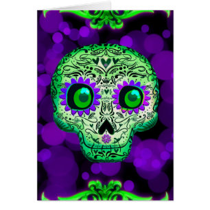Calavera de azúcar verde y morada con iluminación 