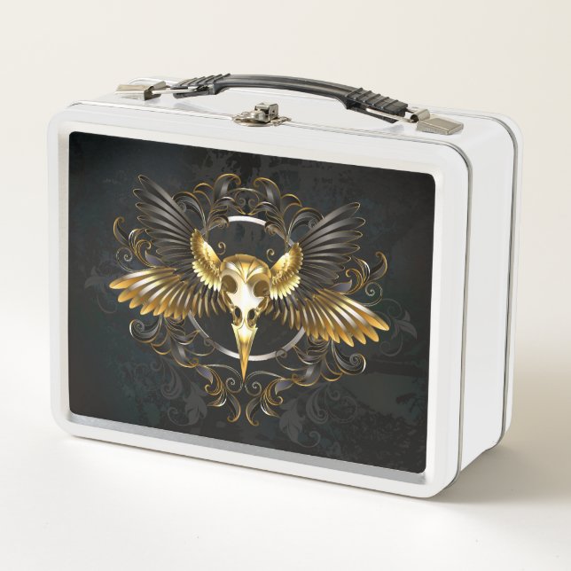 Calavera de pájaro dorado sobre fondo negro (Anverso)