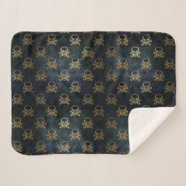 Calavera dorada y manta de cruces