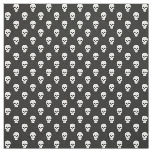 Calaveras blancas sobre tela negra