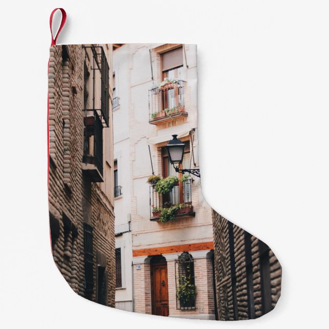 CALCETÍN NAVIDEÑO PEQUEÑO ALEGRÍA DE CONCRETO GRIS DURANTE EL DÍA (Anverso)