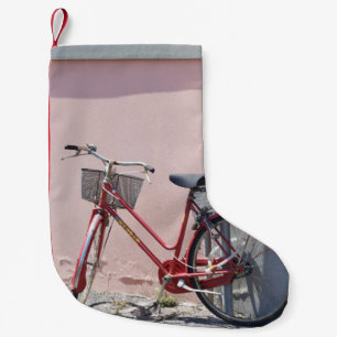 CALCETÍN NAVIDEÑO PEQUEÑO BICICLETA DE COMBUSTIBLE ROJO EN CARRETERA