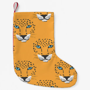Calcetín Navideño Pequeño Cabeza de leopardo naranja, patrón sin costuras.