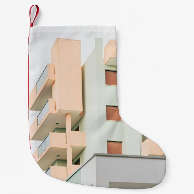 CALCETÍN NAVIDEÑO PEQUEÑO EDIFICIO DE CONCRETO BLANCO Y ROSA (Anverso)