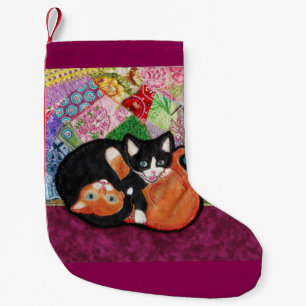 Calcetín Navideño Pequeño Gatitos que juegan en la media del edredón de la