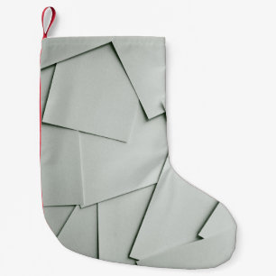 Calcetín Navideño Pequeño Hojas dispersas de papel blanco que cubren la tota