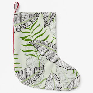 Calcetín Navideño Pequeño Hojas exóticas en un fondo verde. Patada tropical
