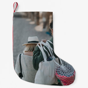 Calcetín Navideño Pequeño Hombre llevando bolsas blancas
