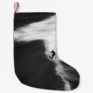 CALCETÍN NAVIDEÑO PEQUEÑO HOMBRE SOBREVIVIENDO EN GRANDES ONDAS