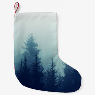 Calcetín Navideño Pequeño Misty fog in pine forest on mountain slopes. Color