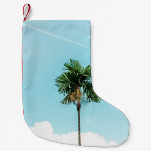Calcetín Navideño Pequeño Palmera verde bajo cielo azul por la mañana