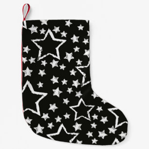 Calcetín Navideño Pequeño patrón abstracto de estrellas sin costuras. Grunge