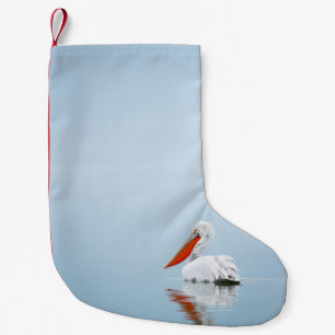 CALCETÍN NAVIDEÑO PEQUEÑO PELICANO EN AGUA AZUL