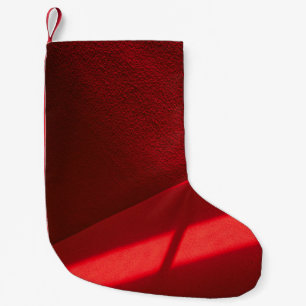 Calcetín Navideño Pequeño Textil rojo en fotografía de primer plano