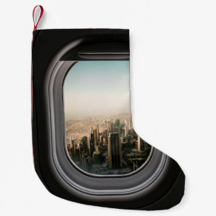 CALCETÍN NAVIDEÑO PEQUEÑO VISTA DE LA CIUDAD A TRAVÉS DEL AVIÓN DURANTE EL D