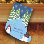 Calcetín Navideño Pequeño Winter Holiday Penguin and Snowman Christmas<br><div class="desc">Celebrate the festive Christmas season with this custom holiday stocking. Stocking features a penguin in a cozy winter hat, a smiling happy snowman, trees covered in snow, white falling snowflakes, and an icy blue pond. Customize with your first name and the year. This cozy stocking will be treasured for many...</div>