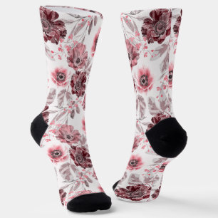 Calcetines Flores rosadas y burdeos sobre fondo blanco.
