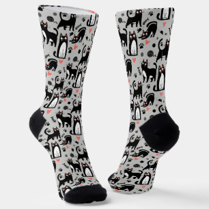 Calcetines Gato negro lindo patrón continuo en un gris claro