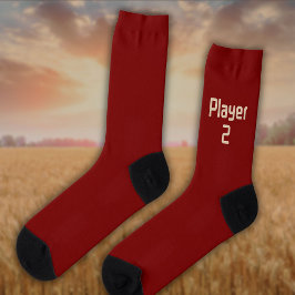 Calcetines Leer al jugador 2 en Beige sobre rojo profundo