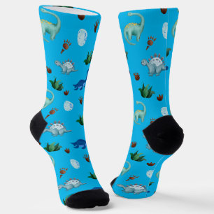Calcetines Múltiples especies de dinosaurios en fondo turques