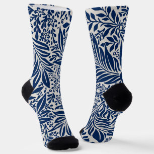 Calcetines patrón floral azul con diversas hojas y flores