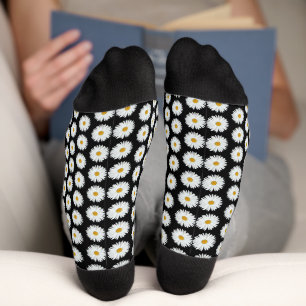 Calcetines Patrón floral de margarita blanca sobre negro