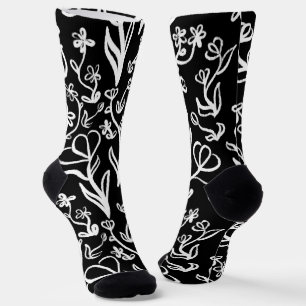Calcetines Patrón floral en blanco sobre negro