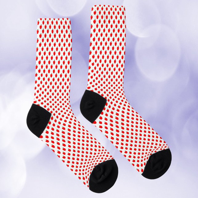 Calcetines Patrón rojo de la fruta de Apple (A pair of socks with a pattern of red apples with green leaves.)