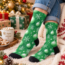 Ramas verdes y copos de nieve