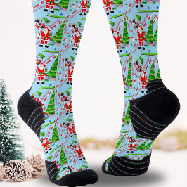 Calcetines Santa jugando golf junto al árbol de Navidad