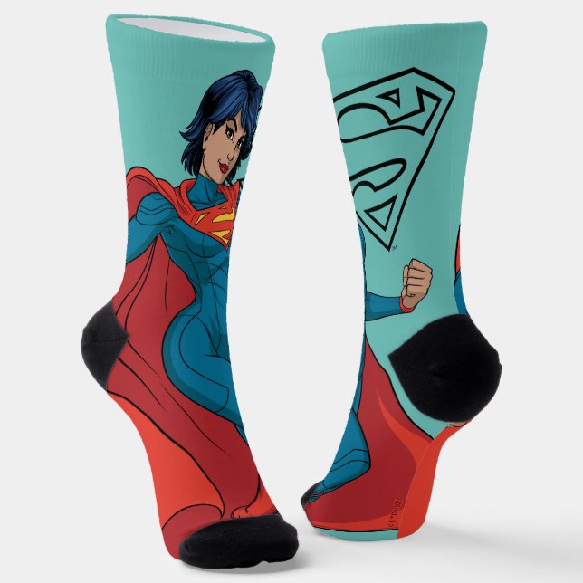 Calcetines Supergirl abusando de un traje azul (Angular)