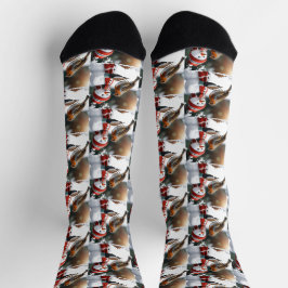 Calcetines Un muñeco de nieve lindo alimentando el diseño de 