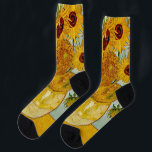 Calcetines Vincent Van Gogh Sunflowers<br><div class="desc">La base de Vicente Van Gogh con 12 girasoles es una de las famosas series de girasoles de Van Gogh. Este cuadro de girasoles forma parte del segundo conjunto de hermosas pinturas de girasol impresionista de Van Gogh, que creó en 1888. Los girasoles son amarillos con un fondo azul claro....</div>