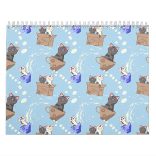Calendario Gatos en caja y gotas de leche en azul