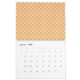 Calendario un fondo blanco y naranja con un patrón