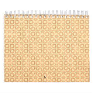Calendario un fondo blanco y naranja con un patrón